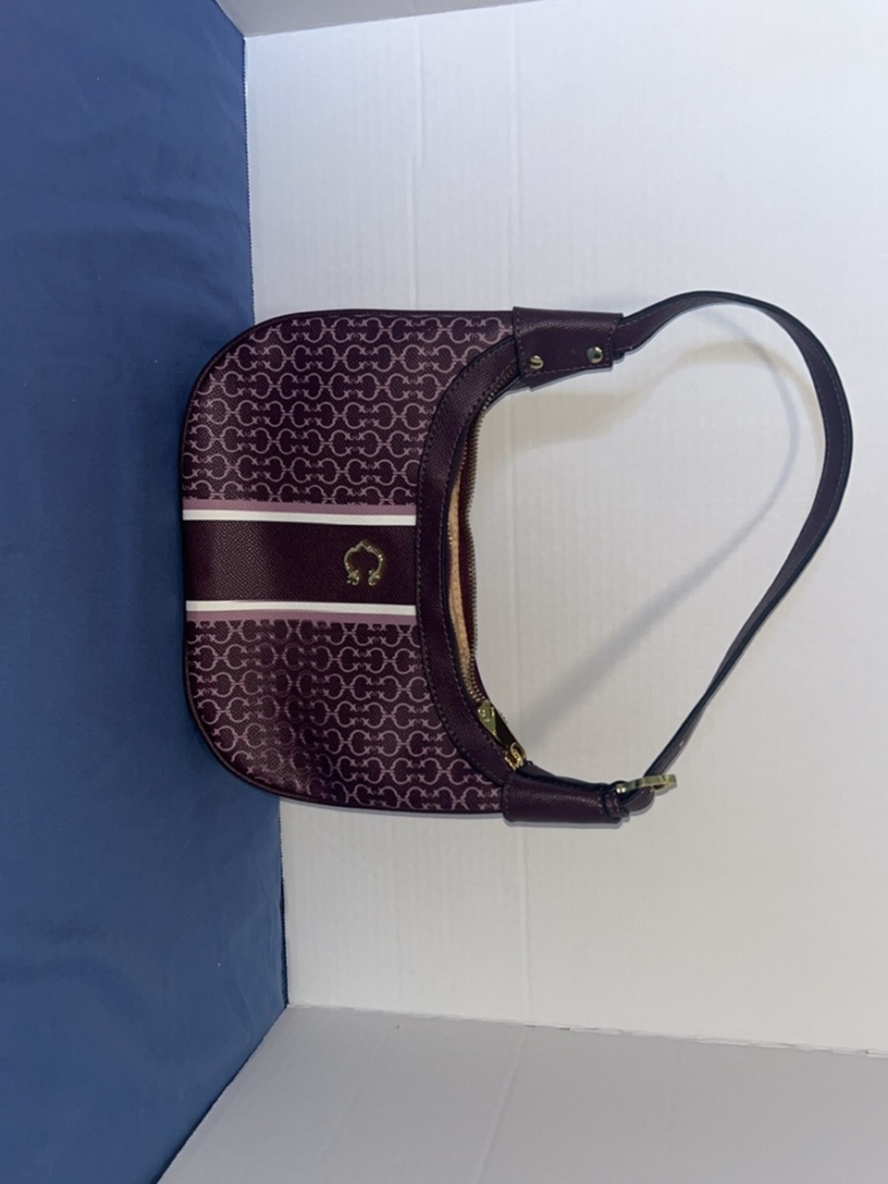 C. Wonder Plum Patterned Shoulder Bag with Pink Stripe